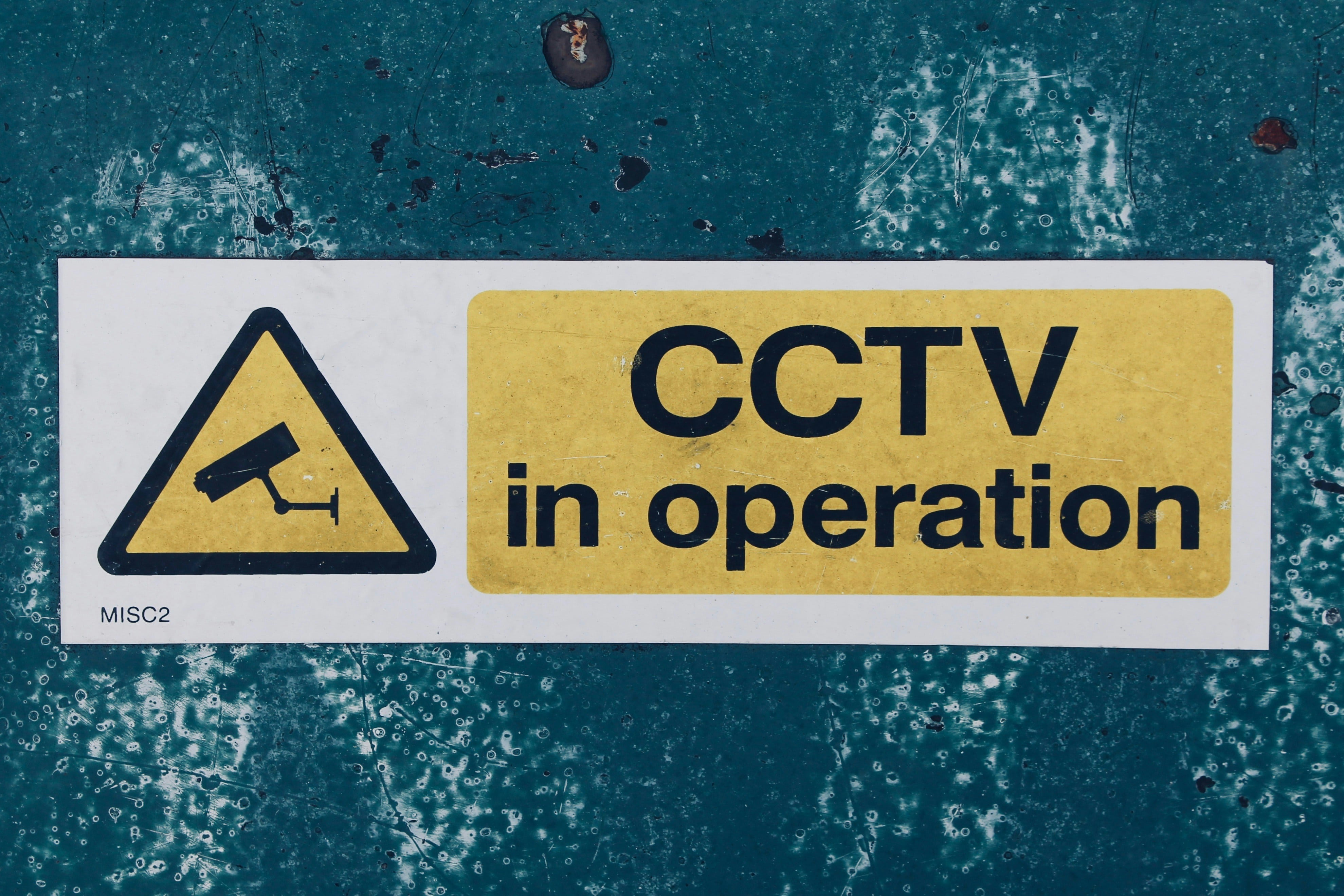 A sign reading "CCTV in operation"